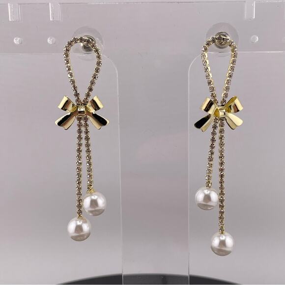 Gold Colored Loop Dangle Bow with Rhinestone and Pearl Accent Earrings - Picture 1 of 5